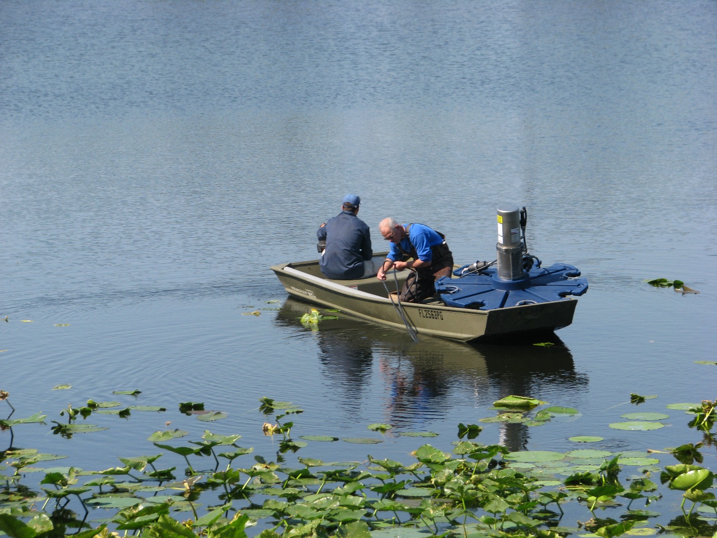 Lake Doctors Technicial Driving a boat