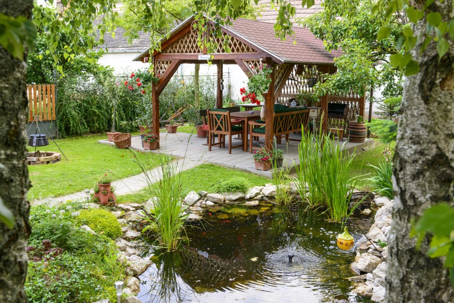 backyard pond with a fountain